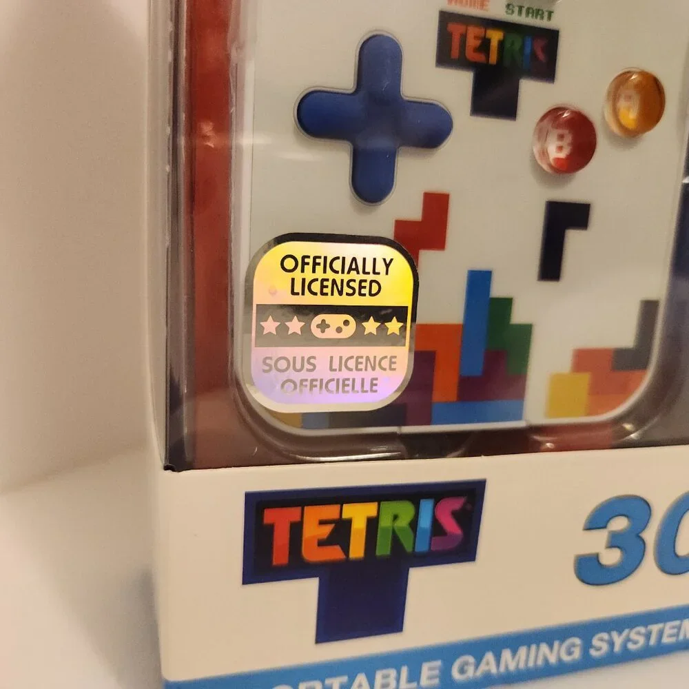 TETRIS Go Gamer with 300 Bonus Games and Travel Case Portable take with game NIB